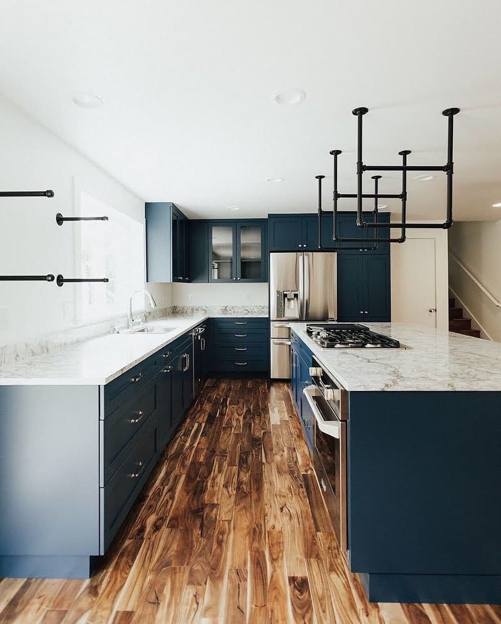 14. Midnight Blue Cabinets with Marble Countertops - dark cabinets kitchen ideas