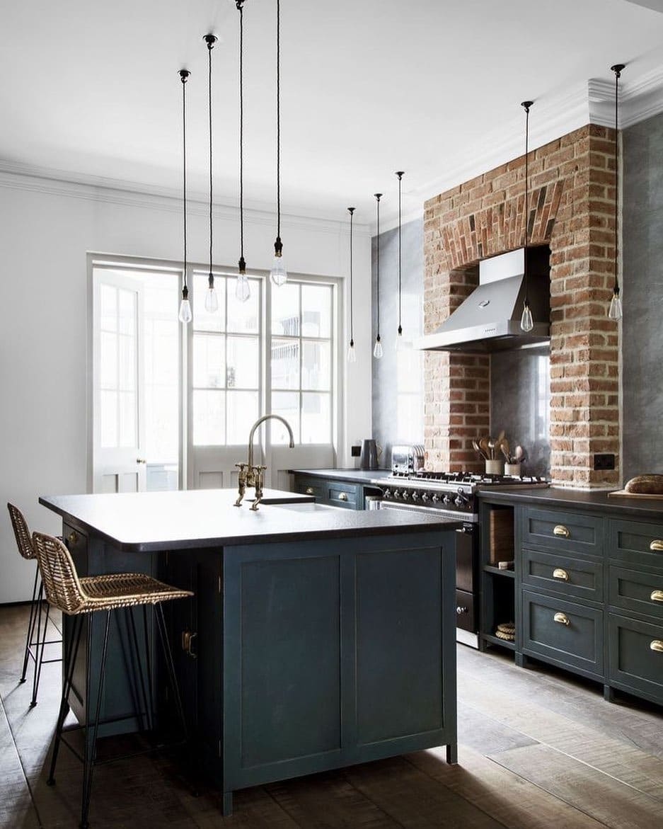 18. Forest Green Cabinets with Exposed Brick Accent - dark cabinets kitchen ideas