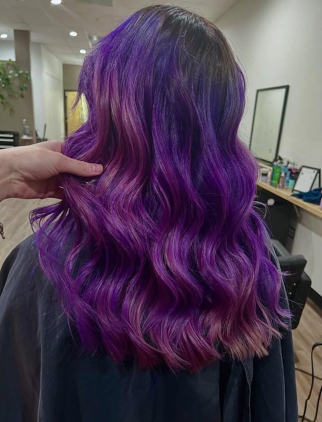 5. Magenta-Infused Violet Balayage - Purple Hair Color