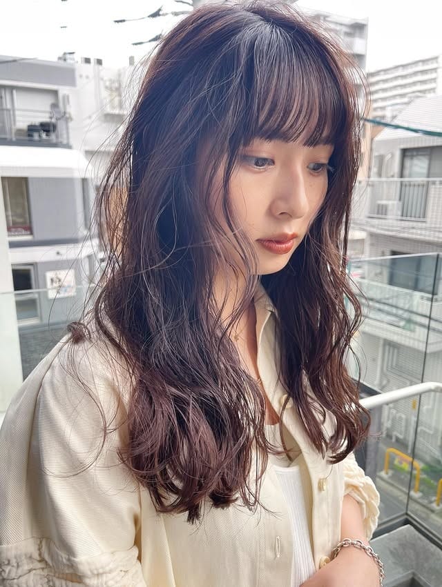 2. Airy Layered Waves with Chocolate Brown Gloss - Long Wave Hairstyles