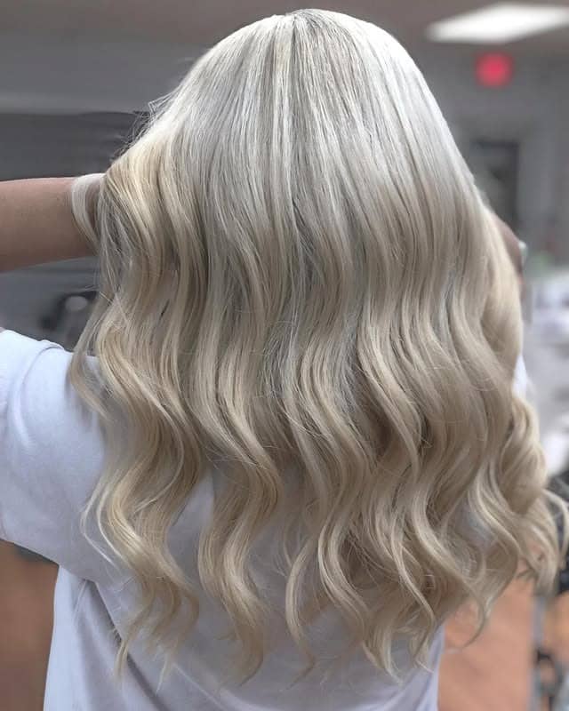 3. Platinum Blonde Sculpted Waves - Long Wave Hairstyles