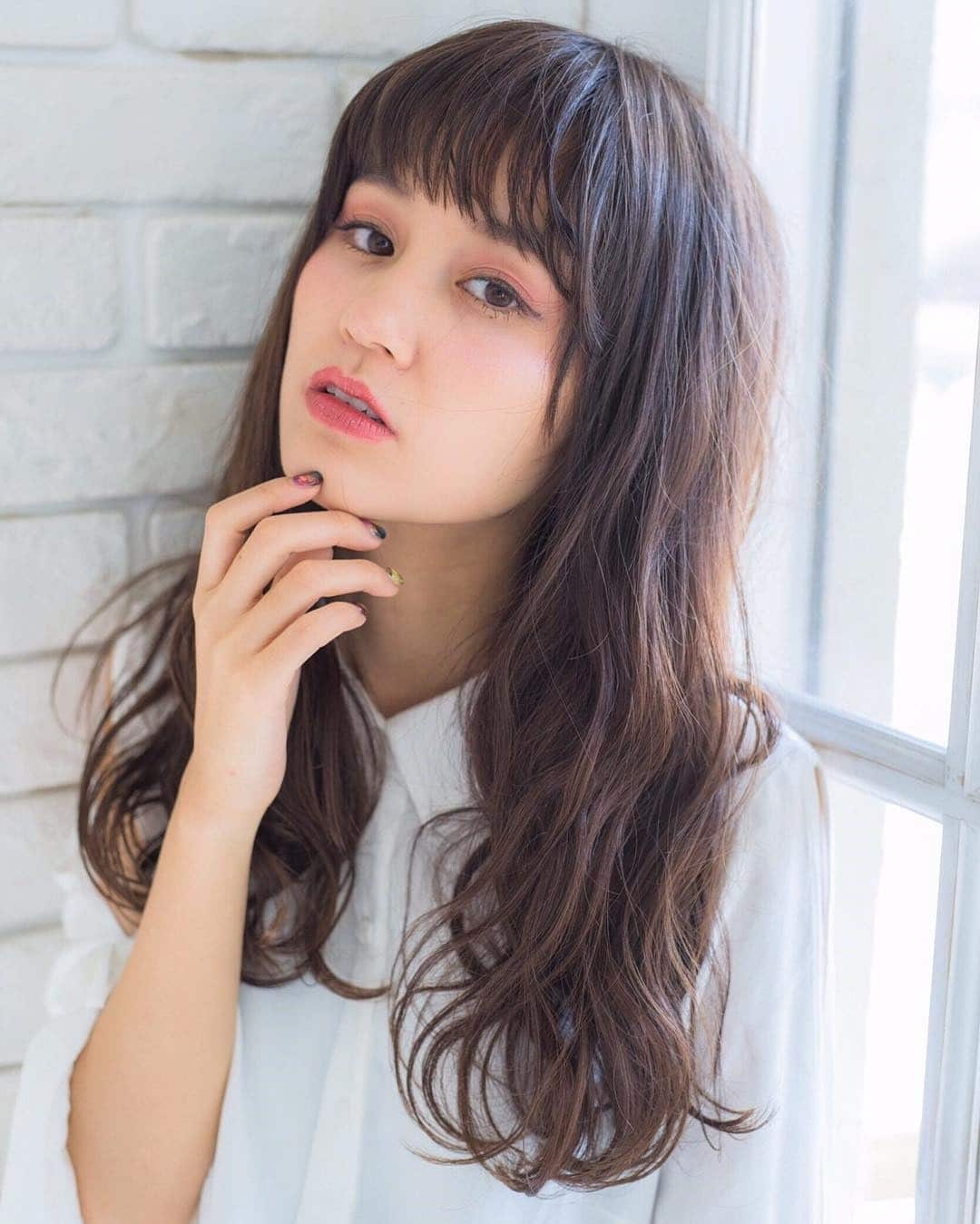 4. Feathered Long Waves with Warm Brunette - Long Wave Hairstyles