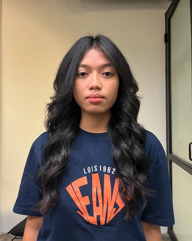 14. Natural Black Cascading Waves - Long Wave Hairstyles