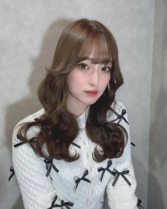 17. Chestnut Brown Glam Waves with Full Bangs - Long Wave Hairstyles