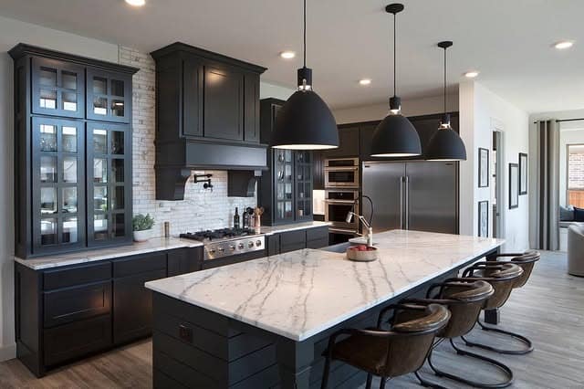 2. Transitional Black Cabinets with White Quartz Island - black cabinets kitchen ideas