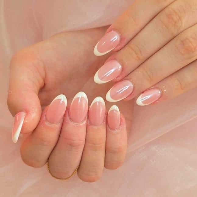 4. Milky Pink Almond French - formal nail ideas