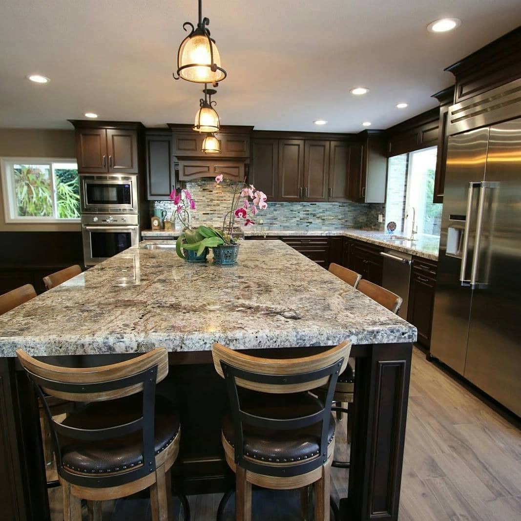 11. Espresso Brown Cabinets with Granite Gathering Island - brown kitchen cabinets ideas
