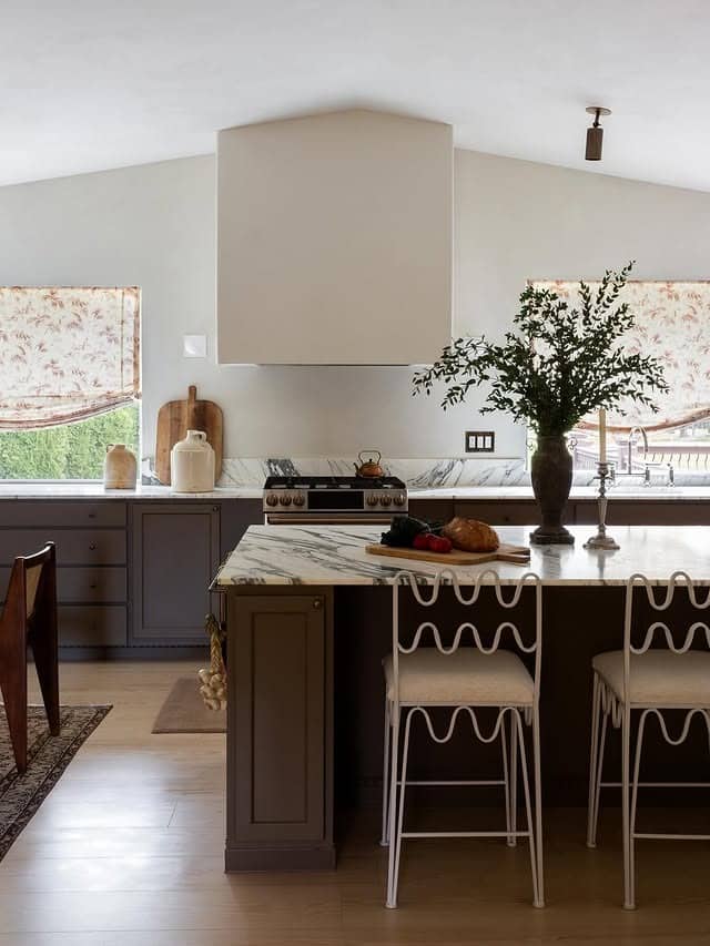 17. Taupe-Brown Cabinets with Statement Marble Island - brown kitchen cabinets ideas