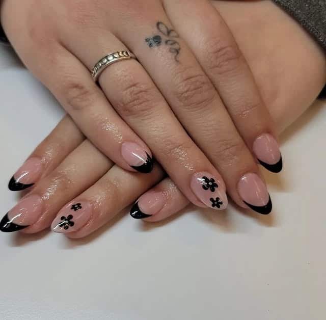 6. Black Micro French with Minimal Floral Art - french tip flower nail ideas
