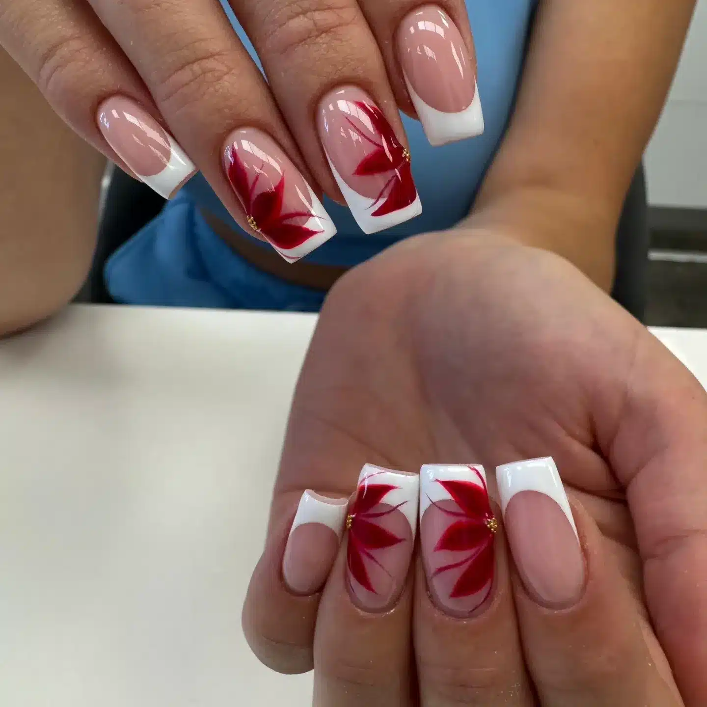 7. Red Floral French Square with Classic White Tips - french tip flower nail ideas