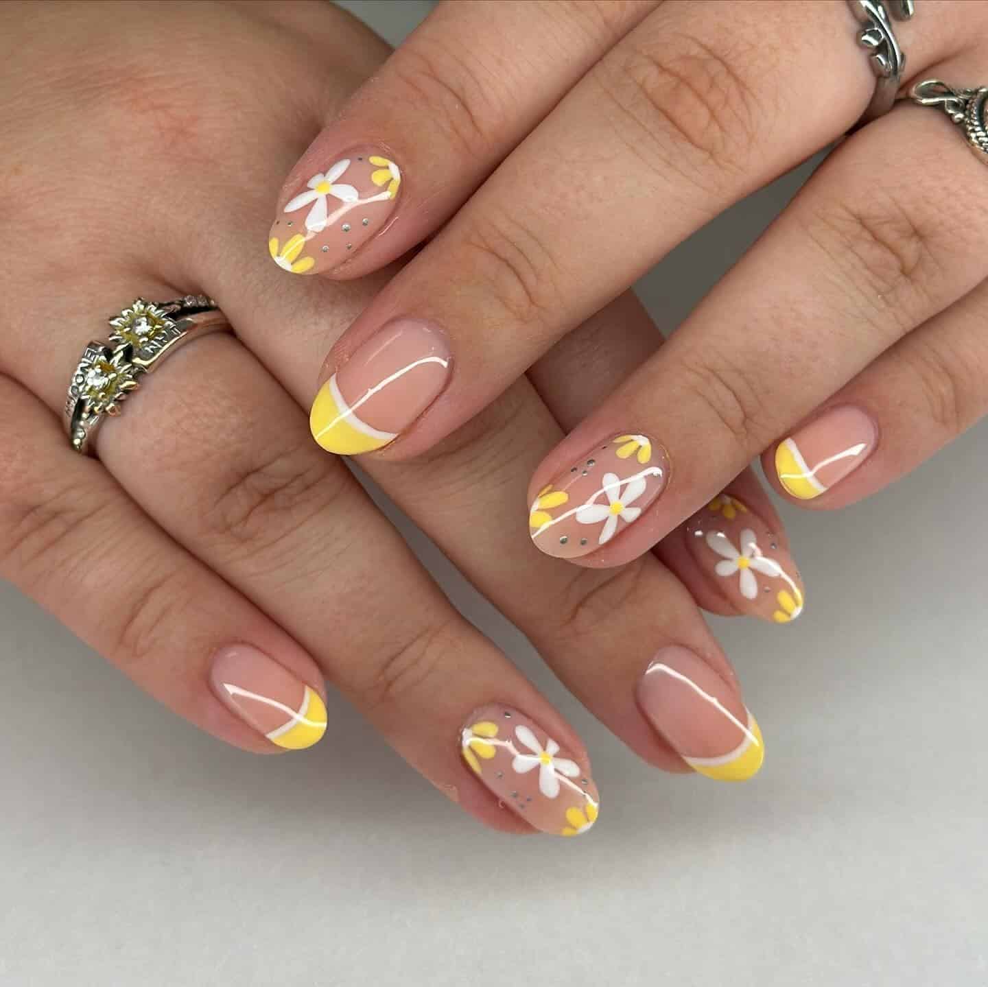 8. Lemon Yellow French with Daisy Accent Art - french tip flower nail ideas