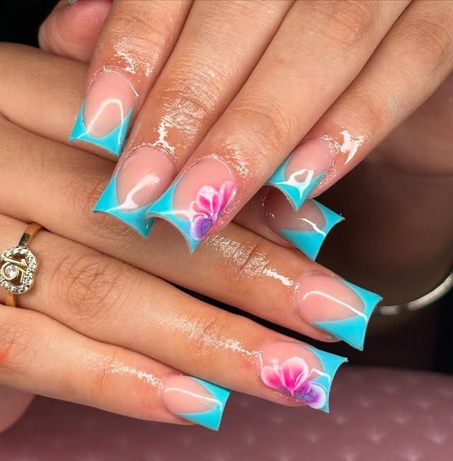 11. Turquoise Square French Tips with Pink Orchid Accent - french tip flower nail ideas