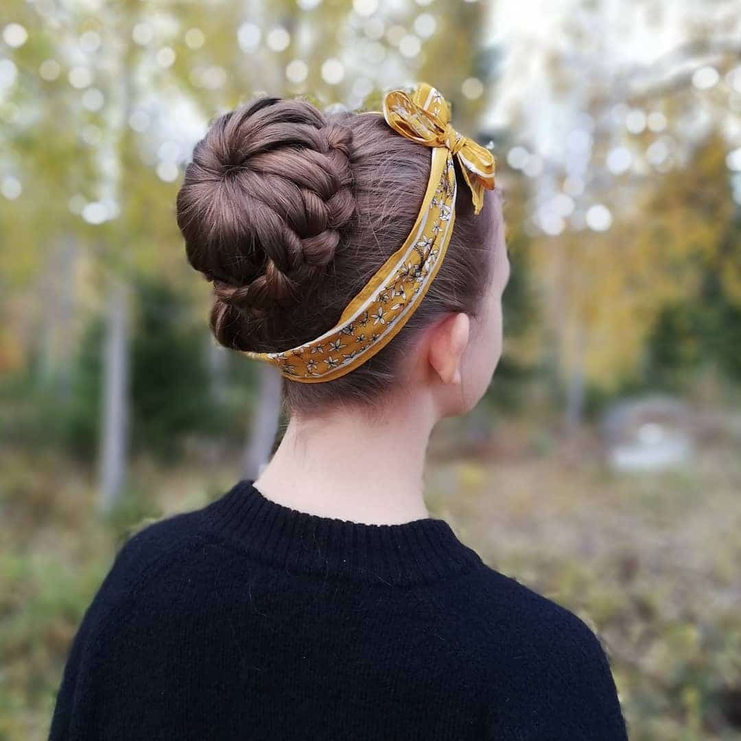7. Braided Bun with Mustard Floral Ribbon - Bandana Hairstyles