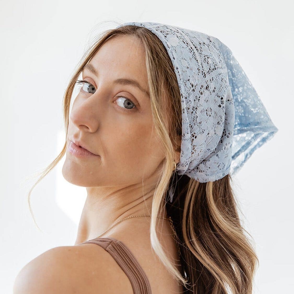 10. Soft Blonde Waves with Sheer Blue Lace Bandana - Bandana Hairstyles