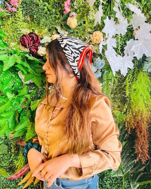 14. Caramel Brunette Waves with Zebra Print Bandana - Bandana Hairstyles