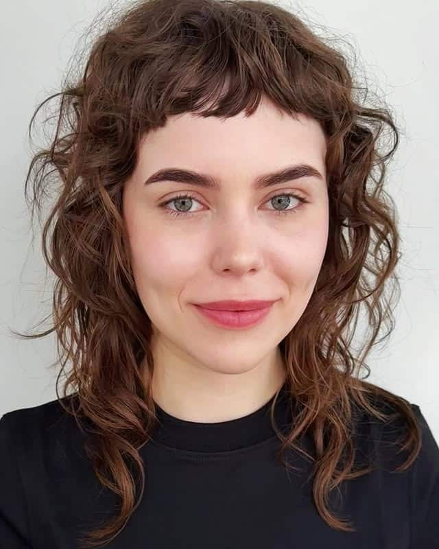 16. Curly 90s Shag with Rich Auburn Brown - 90S Hairstyles