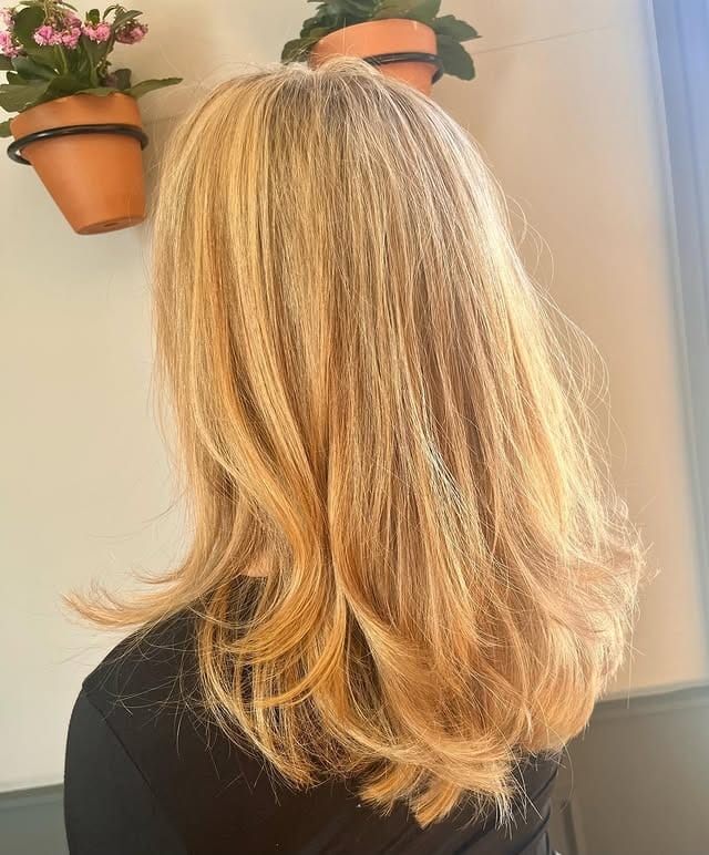 18. Long 90s Feathered Layers in Golden Blonde - 90S Hairstyles