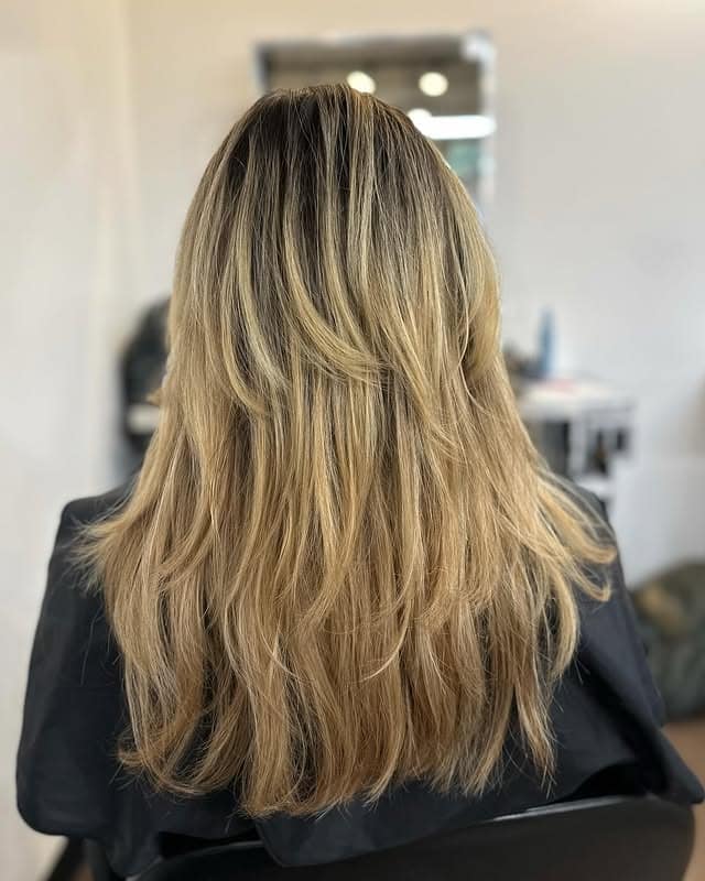 21. 90s Long Layered Cut with Creamy Blonde Balayage - 90S Hairstyles