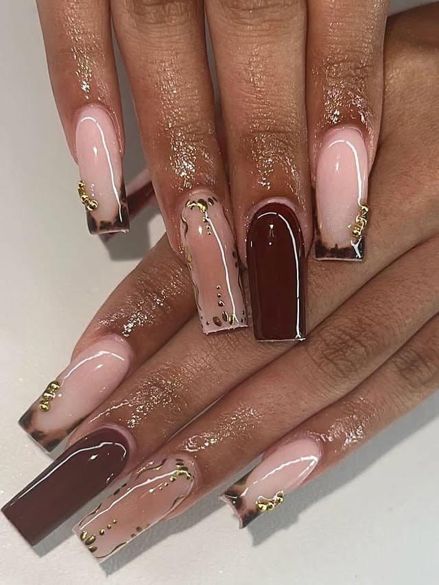 1. Glossy Nude and Chocolate Brown Square Nails with Gold Foil Accents - gold and brown nail ideas