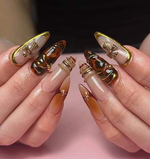 2. Almond Tortoiseshell and Gold Chrome Statement Nails - gold and brown nail ideas