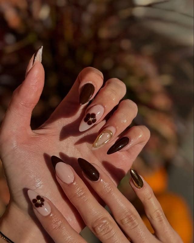 8. Matte Nude and Dark Brown Almond Nails with Gold Framing - gold and brown nail ideas