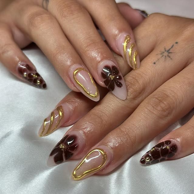 9. Caramel and Chocolate Swirl Almond Nails with Gold Details - gold and brown nail ideas