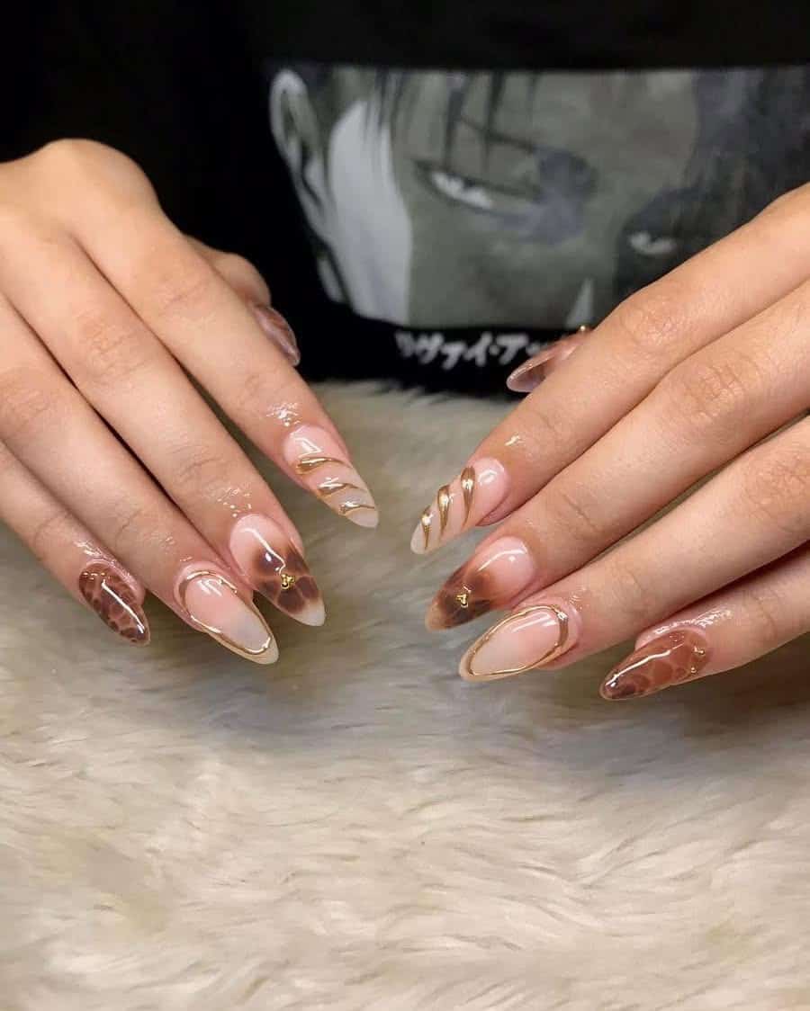 12. Sheer Blush Almond Nails with Caramel Brown French and Gold Accents - gold and brown nail ideas