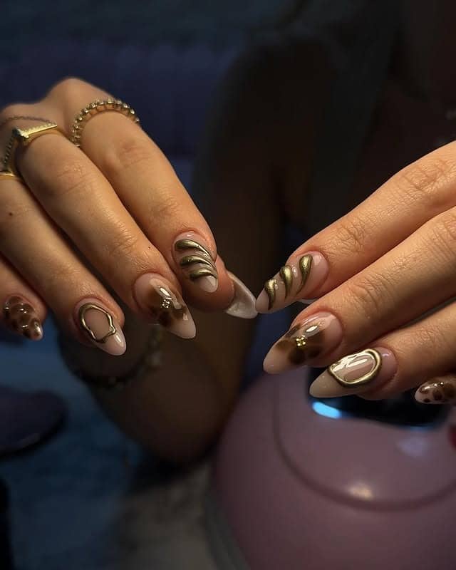 18. Nude and Espresso Almond Nails with Gold Chrome Waves - gold and brown nail ideas