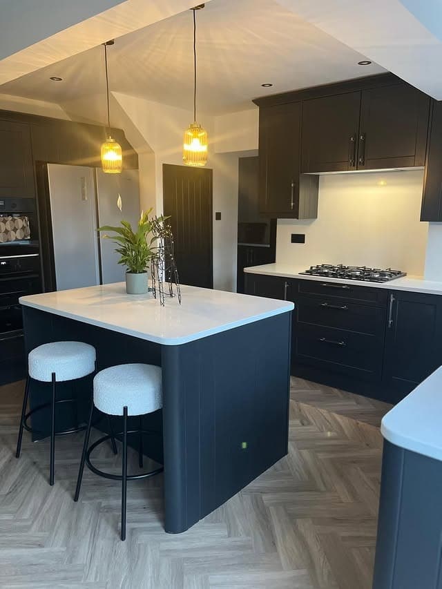 6. Charcoal Garage Kitchen with Contemporary Island - garage kitchen ideas