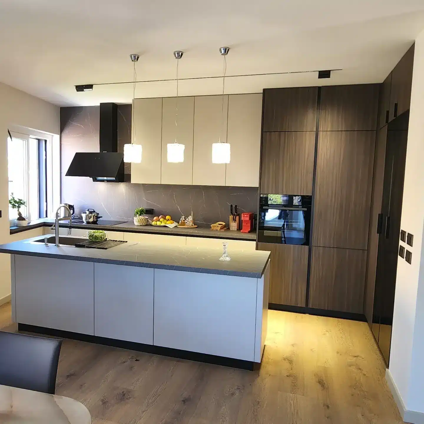 7. Two-Tone Modern Garage Kitchen in Walnut and Cream - garage kitchen ideas