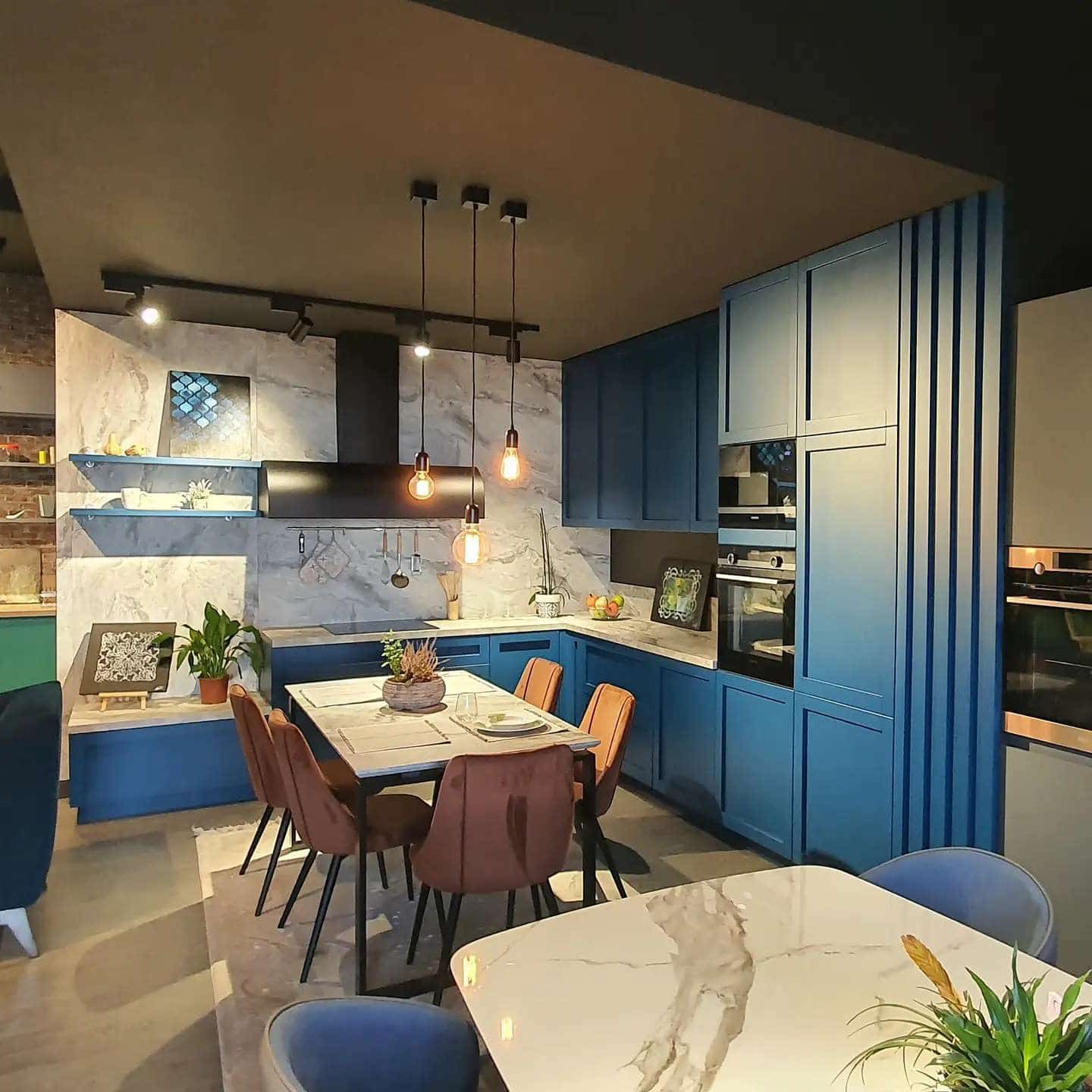8. Deep Blue Contemporary Garage Kitchen with Marble Backdrop - garage kitchen ideas