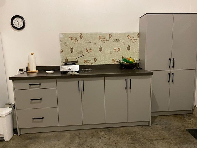 17. Simple Utility Garage Kitchen in Gray and White - garage kitchen ideas