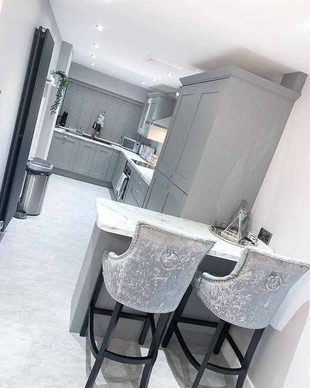 19. Contemporary Gray Garage Kitchen with Marble Breakfast Bar - garage kitchen ideas