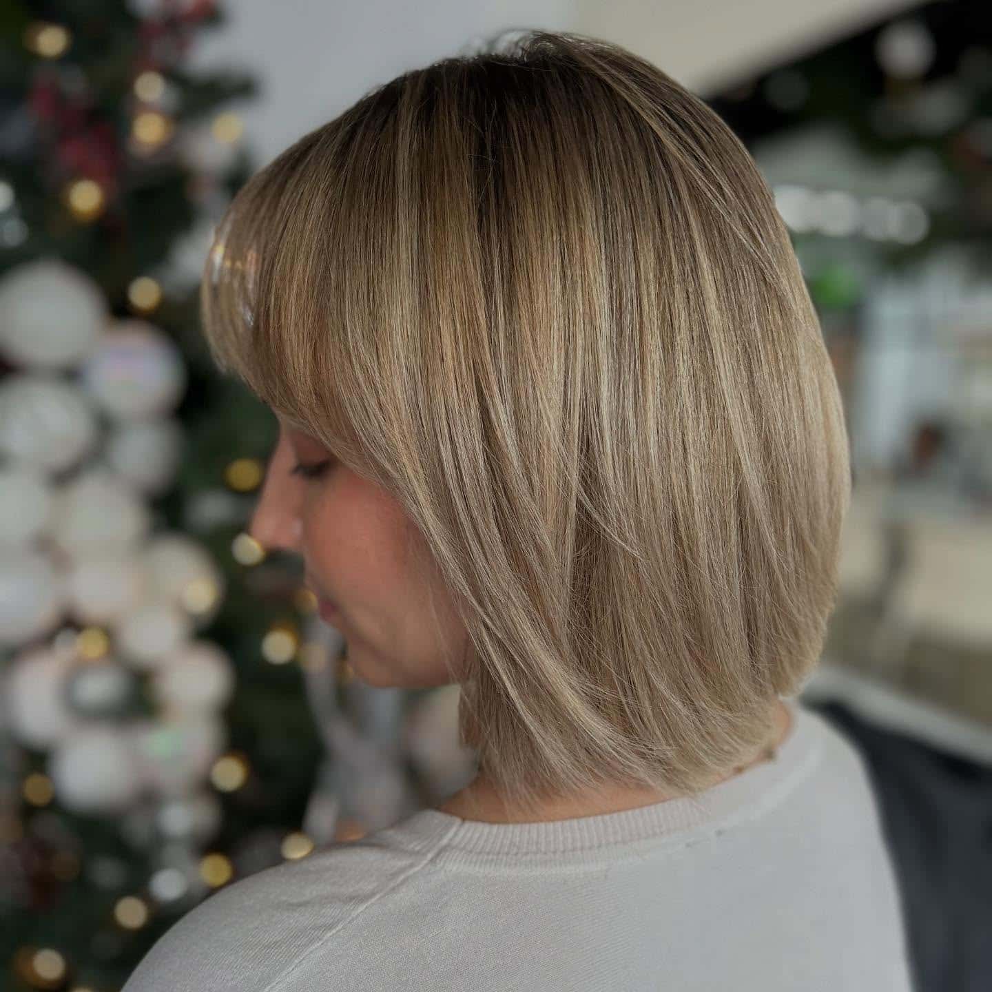 3. Creamy Beige Blonde Layered Bob - Layered Bob Hairstyles