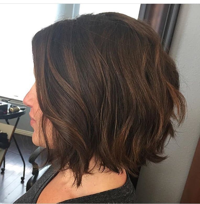 7. Dimensional Chocolate Brown Wavy Bob - Layered Bob Hairstyles