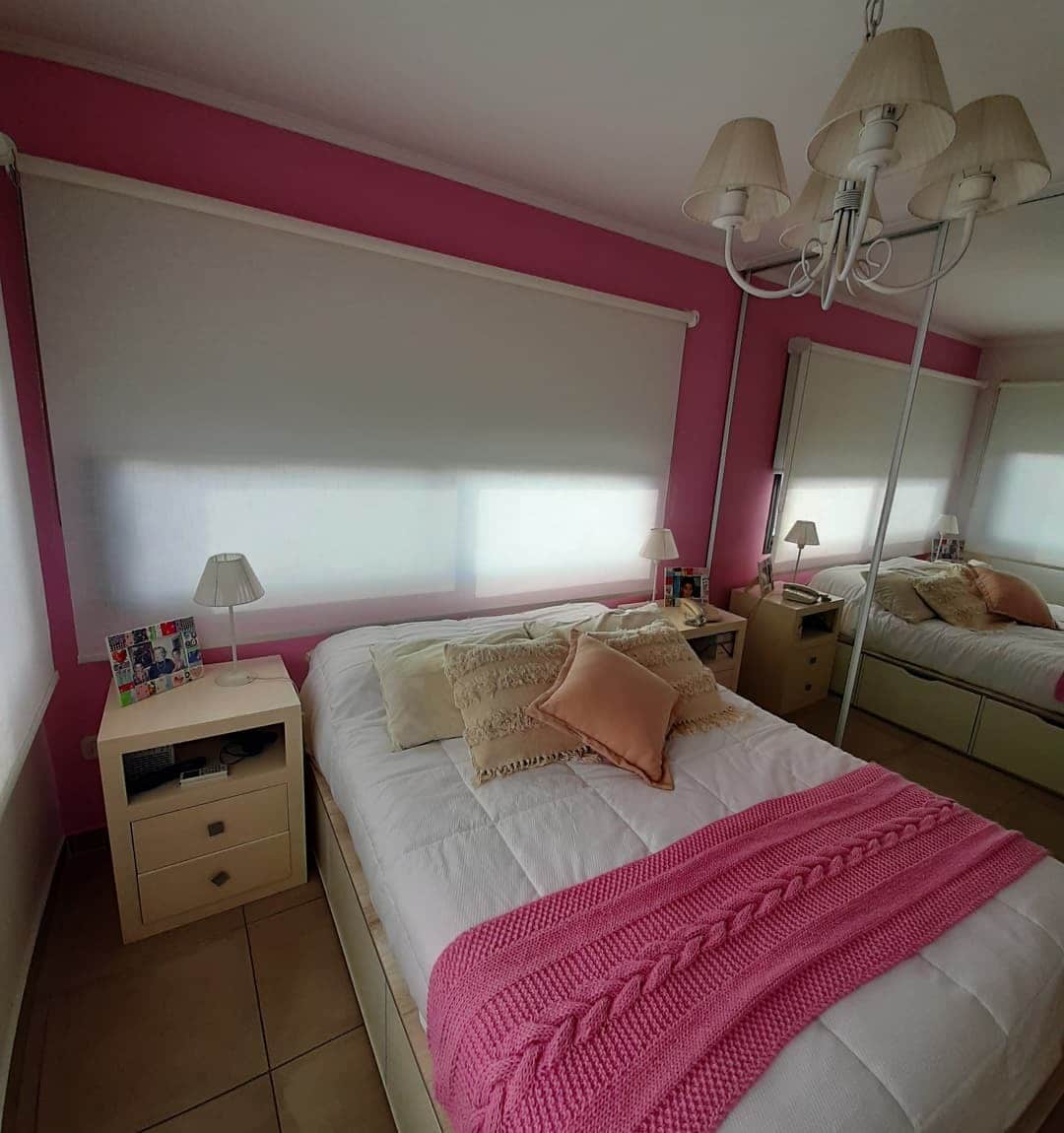 2. Bold Fuchsia Accent Wall with Soft White Layers - pink and white bedroom ideas