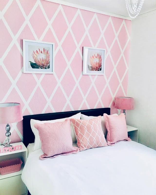 11. Pink Lattice Accent Wall with Crisp White Bedding - pink and white bedroom ideas