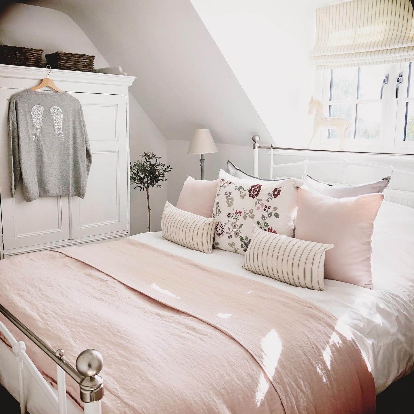 12. Blush and White Cottage Style with Soft Florals - pink and white bedroom ideas