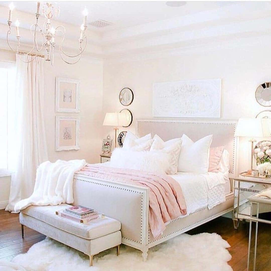 15. Elegant Blush and White with Upholstered Nailhead Bed - pink and white bedroom ideas