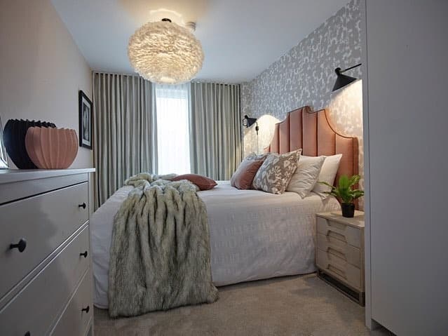 19. Modern Blush Headboard with Patterned White Walls - pink and white bedroom ideas