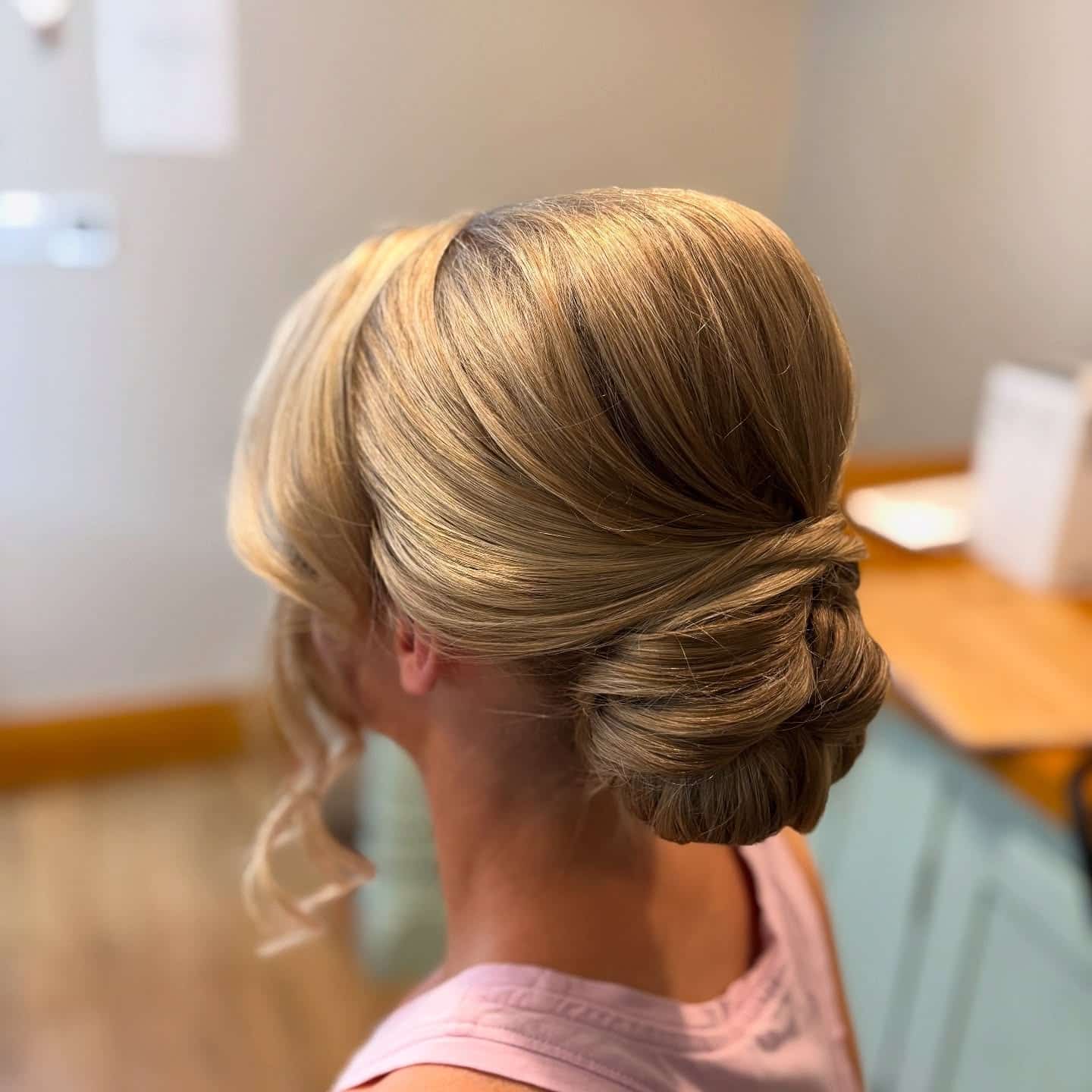 9. Smooth Low Chignon with Soft Beige Blonde Finish - Bridesmaid Hairstyles