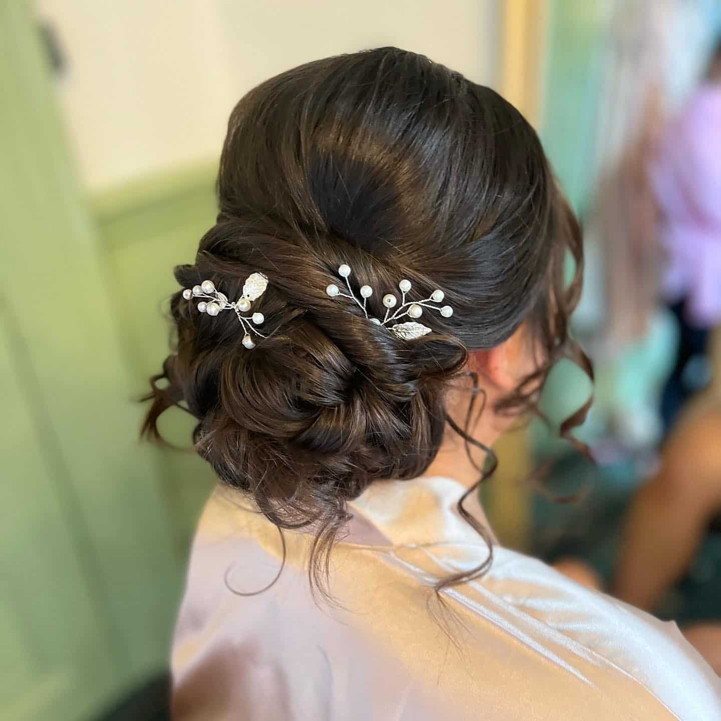 11. Textured Low Bun with Rich Espresso Brown - Bridesmaid Hairstyles