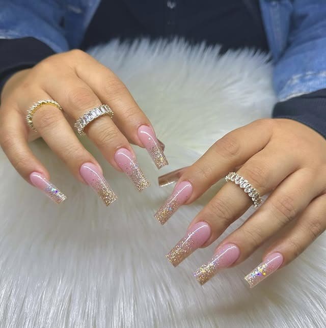 4. Cool Ash Brown Blowout with Pink and Gold Glitter Coffin Nails - gold glitter nail ideas