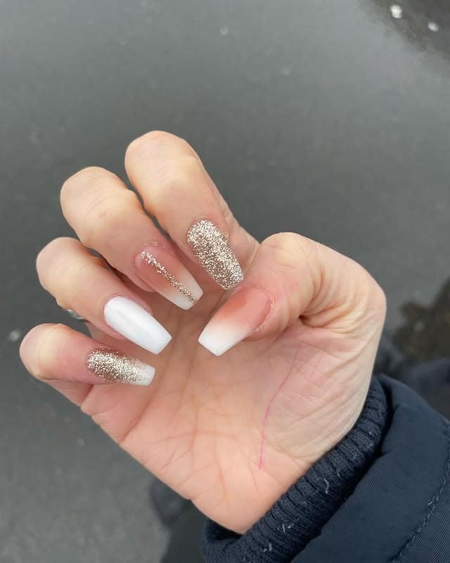 9. Soft Beige Blonde Hair with White and Gold Glitter Mix Nails - gold glitter nail ideas