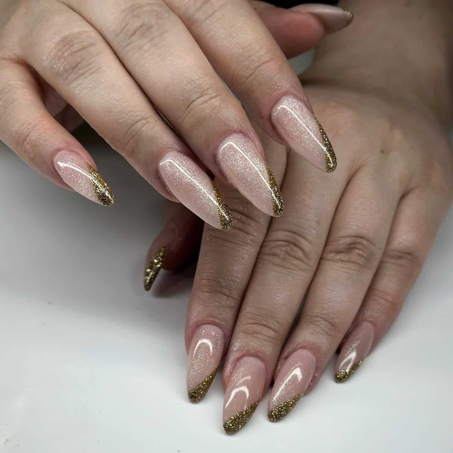 16. Champagne Blonde Soft Waves with Gold Diagonal French Tips - gold glitter nail ideas