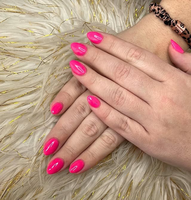 7. Short Almond Neon Pink Nails - hot pink almond nail ideas
