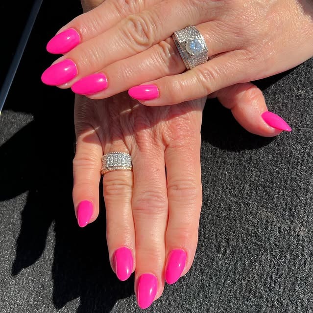 17. Bright Pink Almond Nails with Sunlit Shine - hot pink almond nail ideas