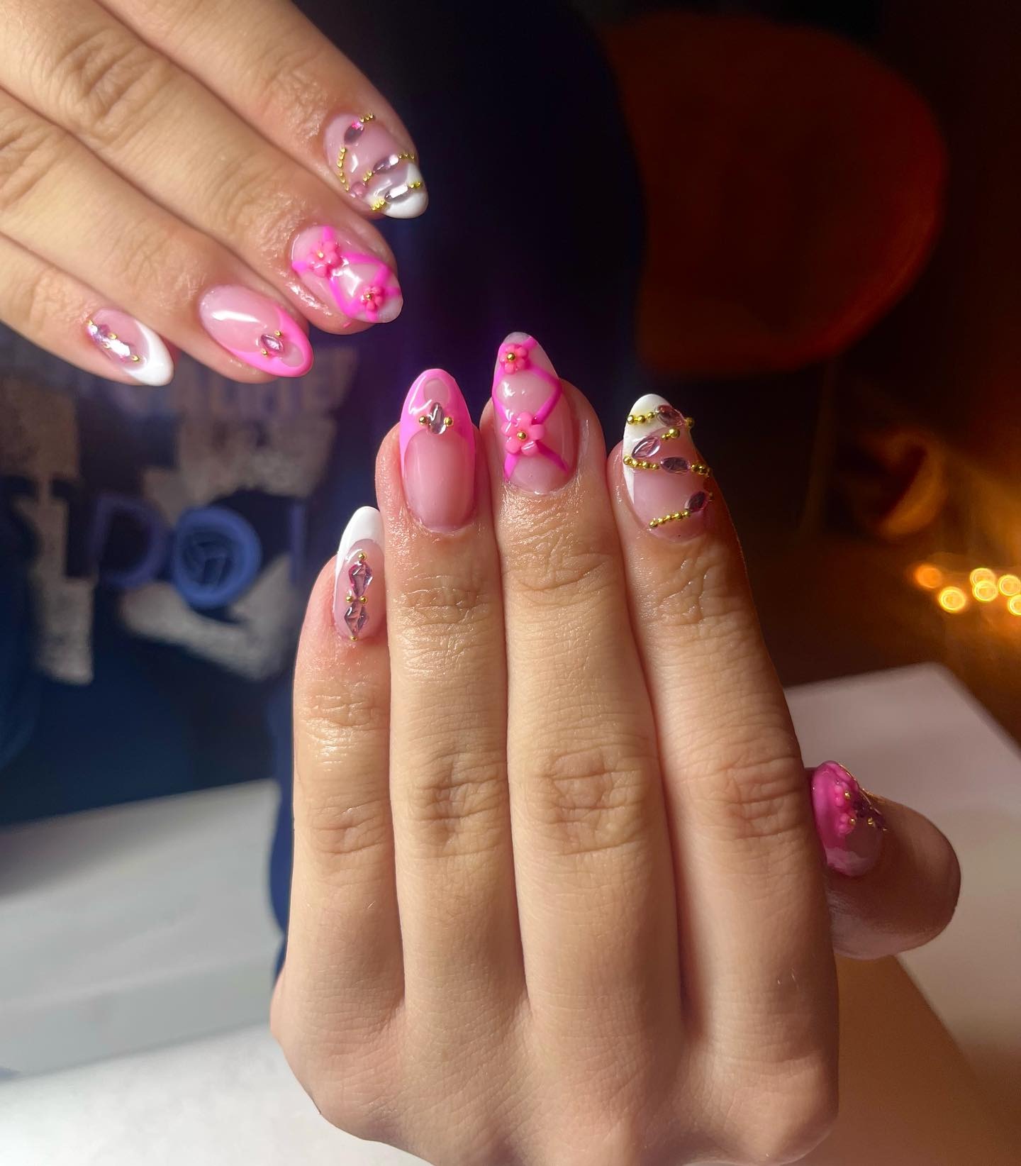18. Pink 3D Floral and Gold Chain Almond Nails - hot pink almond nail ideas
