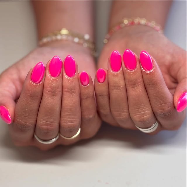 20. Short Bright Pink Almond Nails - hot pink almond nail ideas