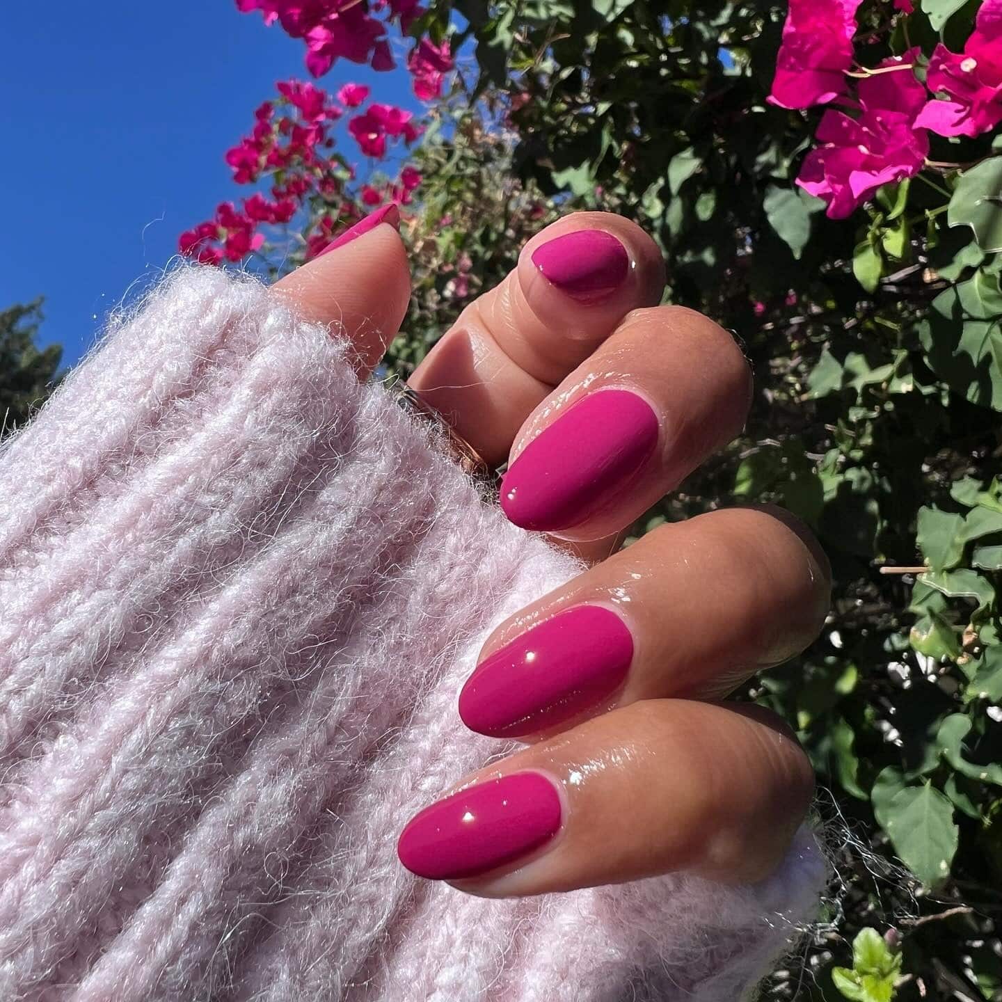 21. Glossy Fuchsia Pink Almond Nails - hot pink almond nail ideas
